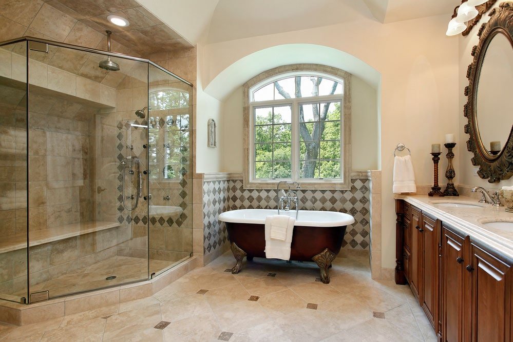 A large bathroom with a tub and shower.