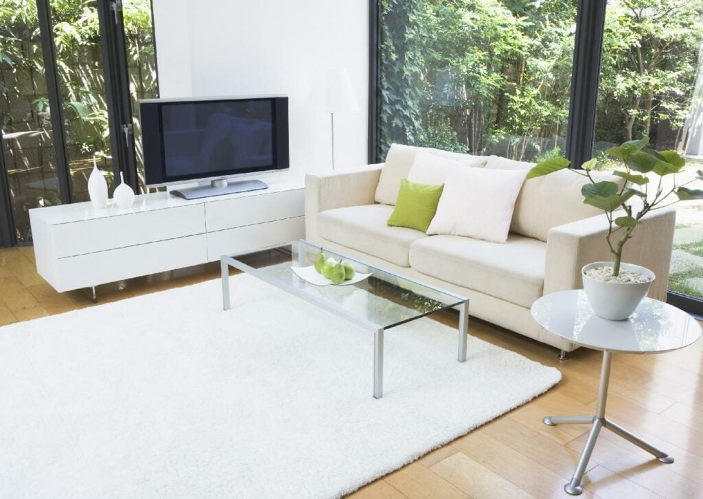 A white couch in a living room.