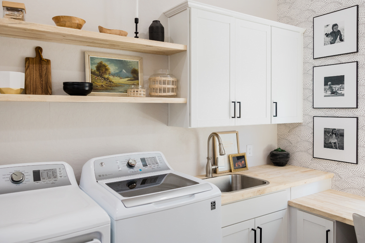 A washer and dryer in one of the efficient laundry room layouts.