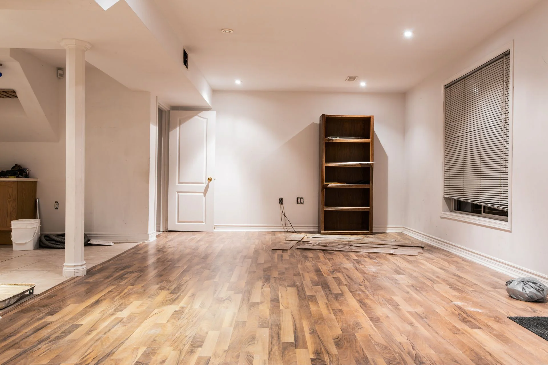 A basement that is being remodeled with finishing touches.