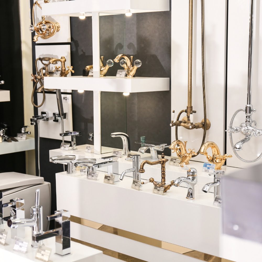 A Commercial bathroom showroom offering a wide selection of faucets for remodeling projects.