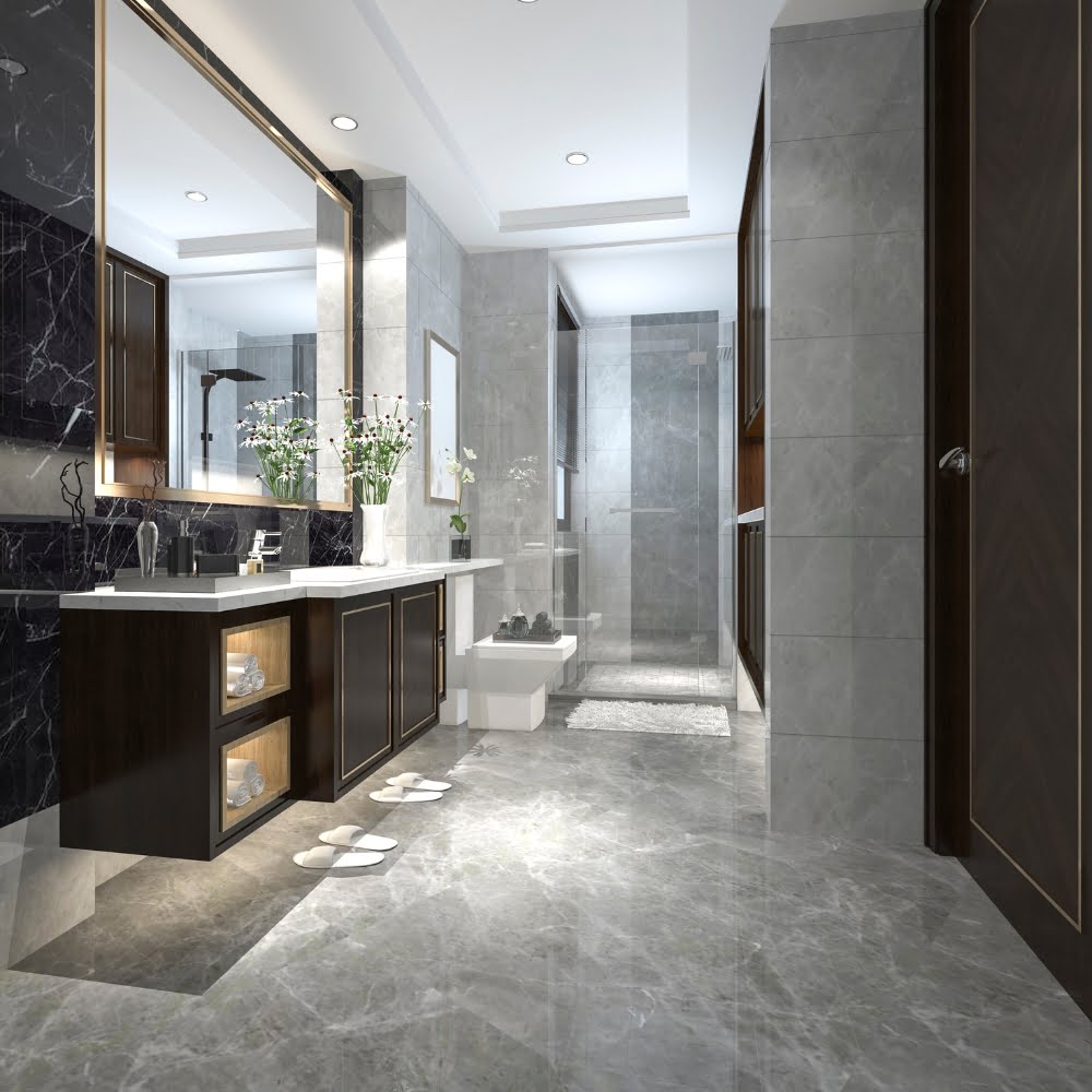 A modern commercial bathroom with marble floors and walls, perfect for bathroom remodeling.