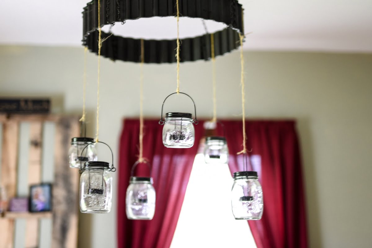 A group of small glass jars from a chandelier for living room lighting ideas.