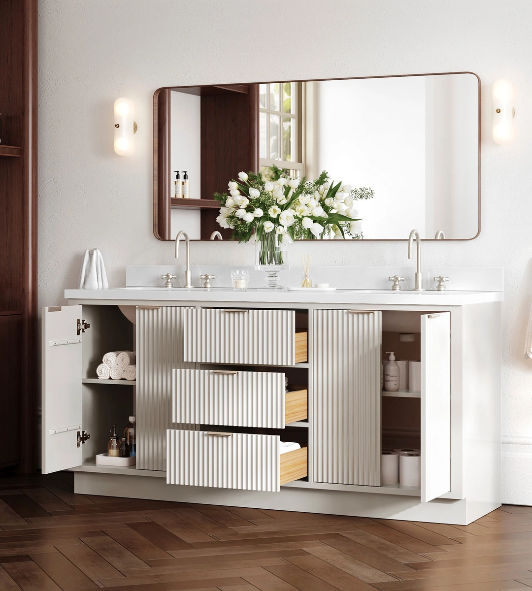 A modern bathroom, perfect for an office bathroom remodel, features a double sink vanity with open drawers and cabinets displaying towels, complemented by a large mirror above and fresh flowers on the countertop.