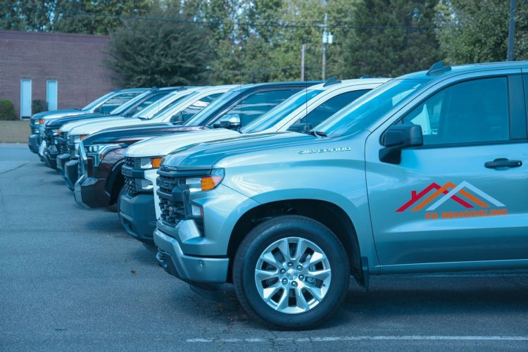 Chevrolet silverado trucks parked in a parking lot.